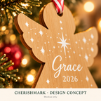 CherishMark personalised bamboo Christmas angel: AI-generated white-print design concept, not an actual product photograph or exact physical scale; styling props not included.
