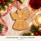 CherishMark personalised bamboo Christmas angel: AI-generated white-print design concept, not an actual product photograph or exact physical scale; styling props not included.