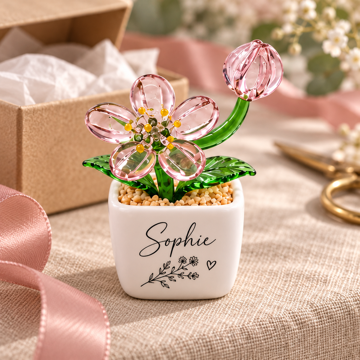 Pink glass bloom and bud with Sophie floral design in a gift styling scene. Personalisation example; one selected pot per order; props not included.