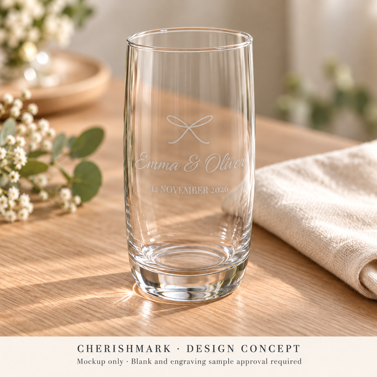 CherishMark personalised 350 ml drinking glass: AI-generated design concept, not an actual product photograph. Blank and engraving sample approval required; styling props not included. Light frosted-engraving visualisation; not opaque printed ink or a guaranteed physical finish.