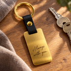 Illustrative gold stainless steel and black leather keyring: 03-message-engraving