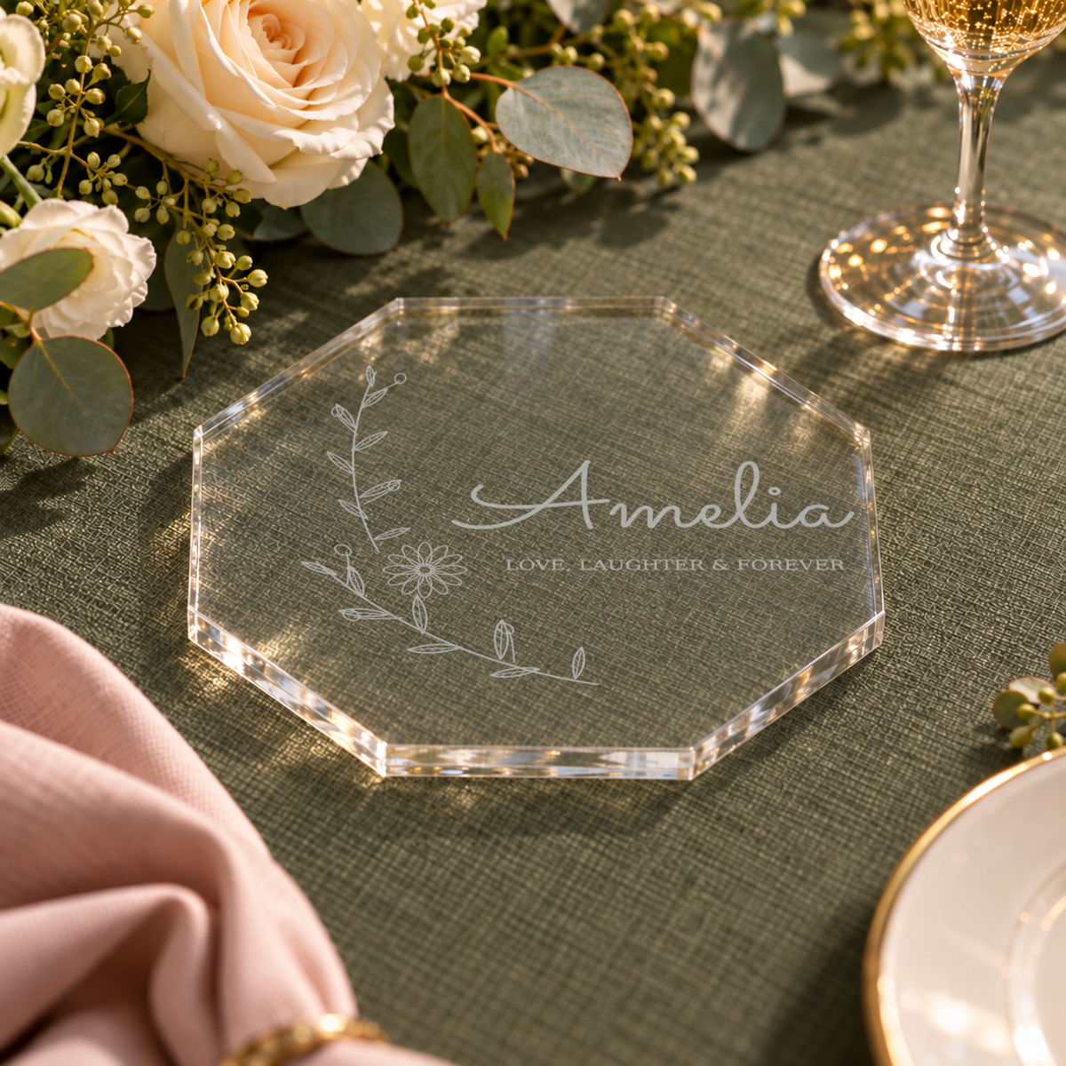 Digital product visualisation of the clear octagonal acrylic wedding coaster, showing the engraved botanical artwork and transparent edge; styling props not included.