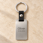 AI illustrative silver brushed stainless steel and black leather keyring: 02-name