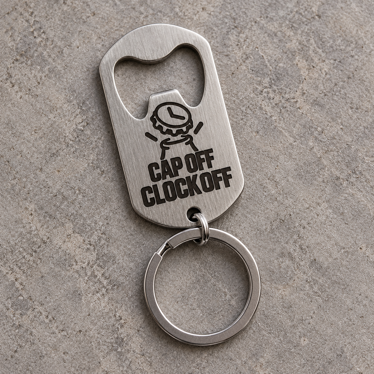 Silver brushed stainless steel bottle opener keyring, front angle; generated visualisation based on actual product photo, engraving examples; styling props not included