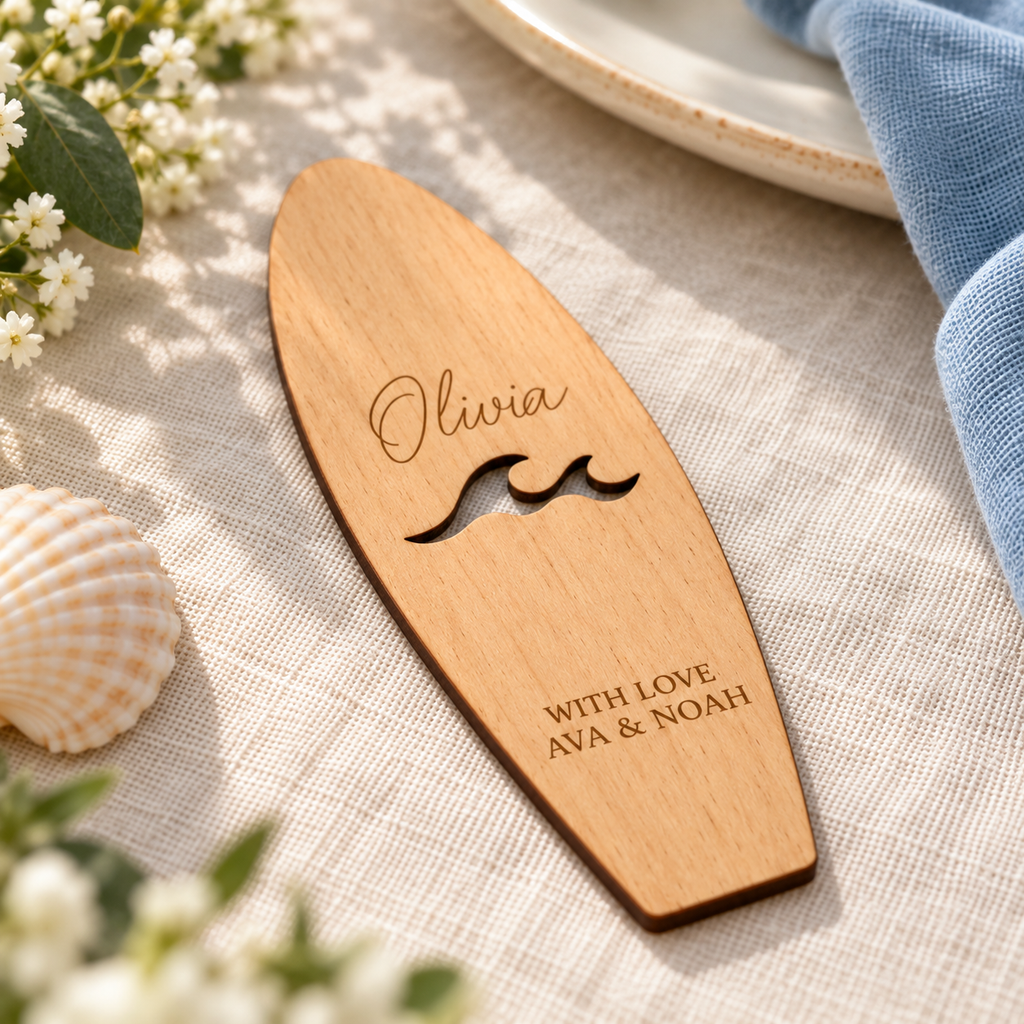 Digital product visualisation of the personalised Olivia wooden surfboard place card, showing the wave cut-out and thin edge in an oblique view; stand not shown and styling props not included.