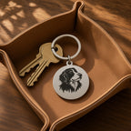 Engraved pet portrait keyring with house keys in a tan leather valet tray
