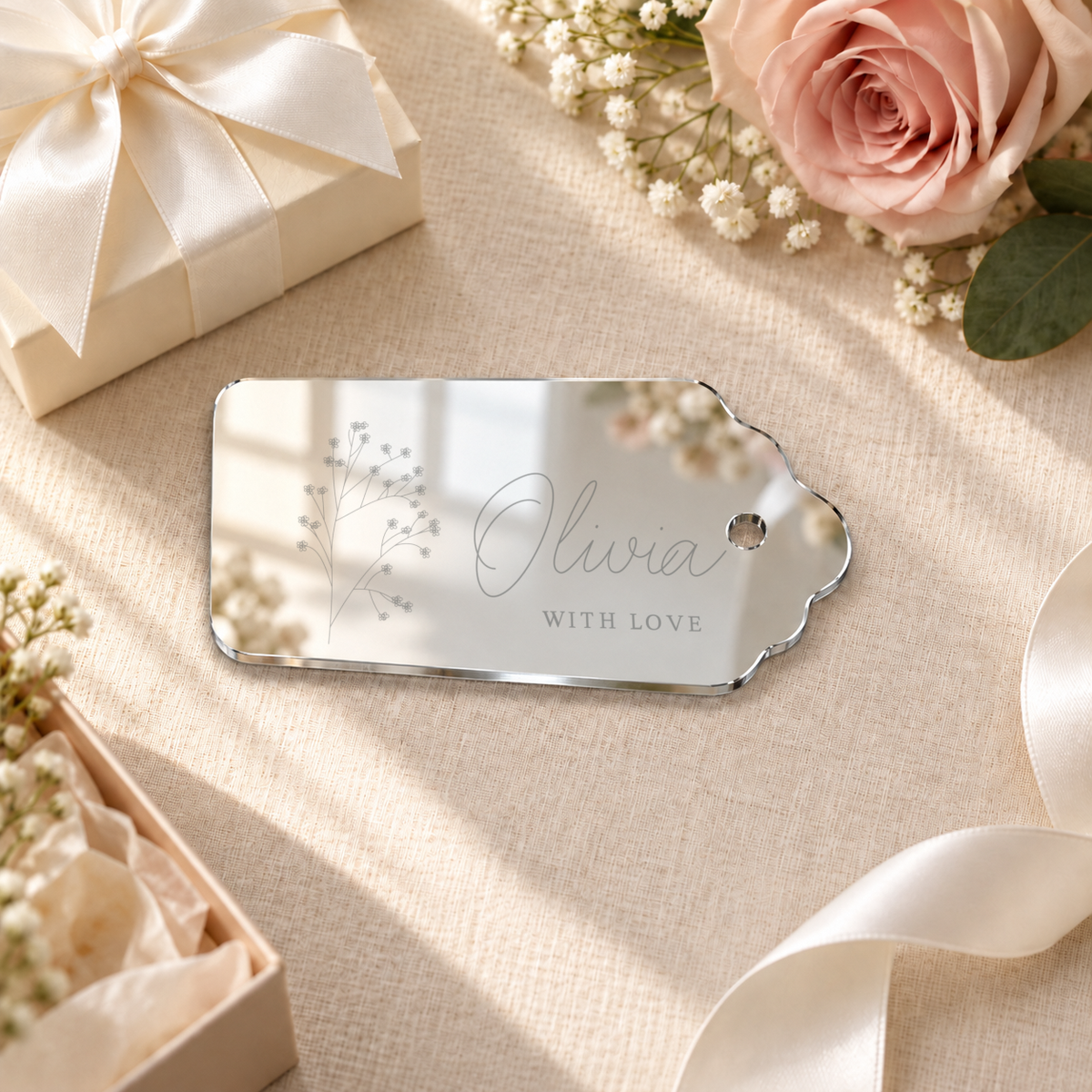 Mirror Silver rectangle acrylic wedding gift tag, personalized engraving example — digital scene visualization. Selected tie option not shown; styling props not included.